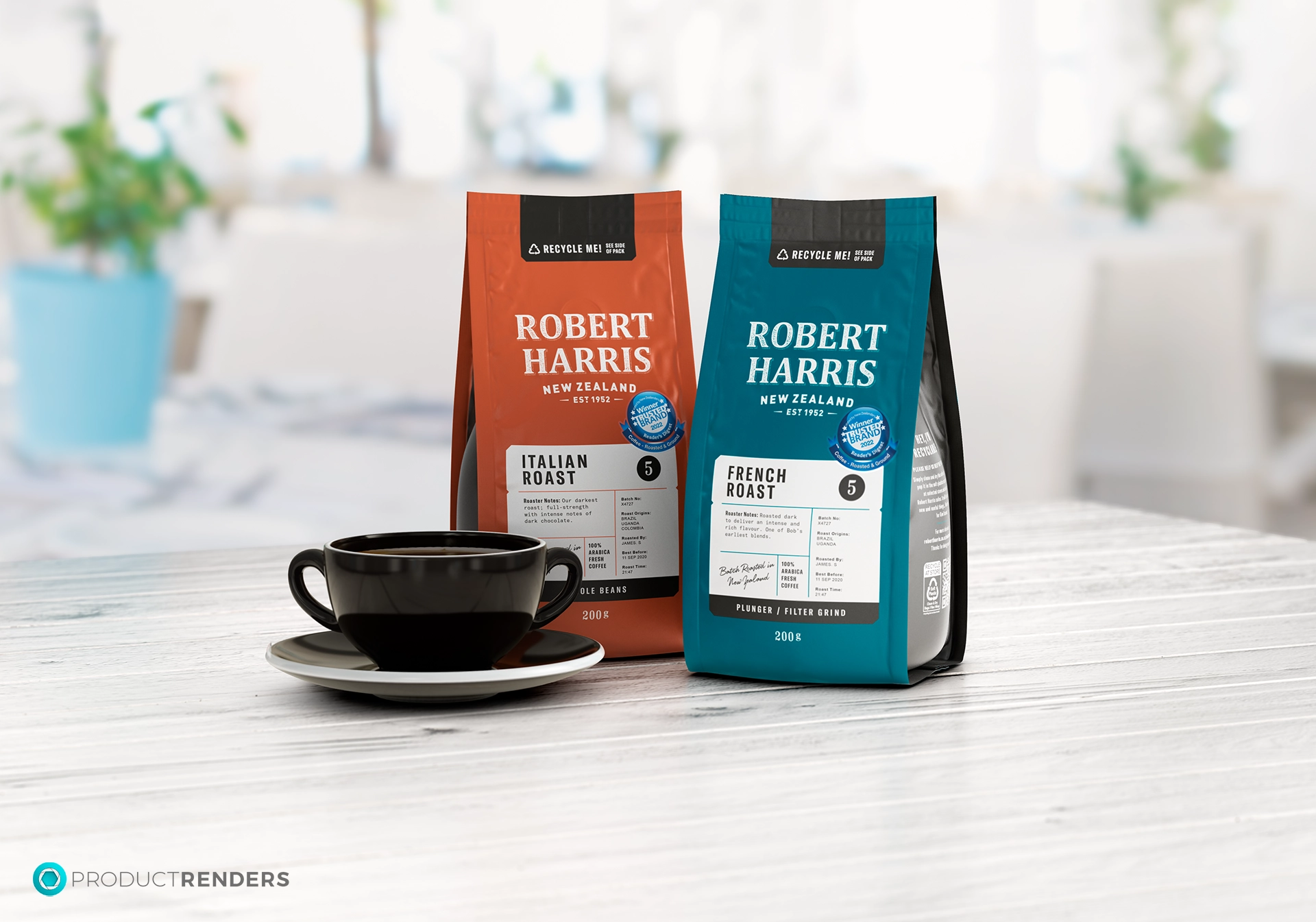 Two bags of Robert Harris coffee, Italian Roast and French Roast, with a cup of coffee on a wooden table.